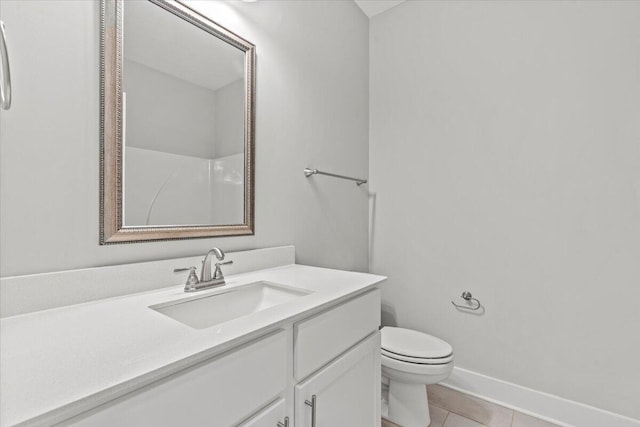 2318 Laurens St, Grovetown, GA 30813 - bathroom featuring vanity, toilet, tile patterned flooring, and baseboards