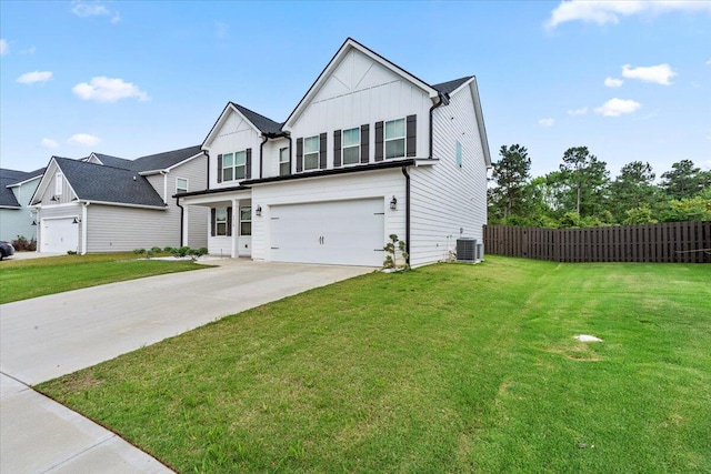 2318 Laurens St, Grovetown, GA 30813 - view of front of property featuring board and batten siding, concrete driveway, an attached garage, and central AC
