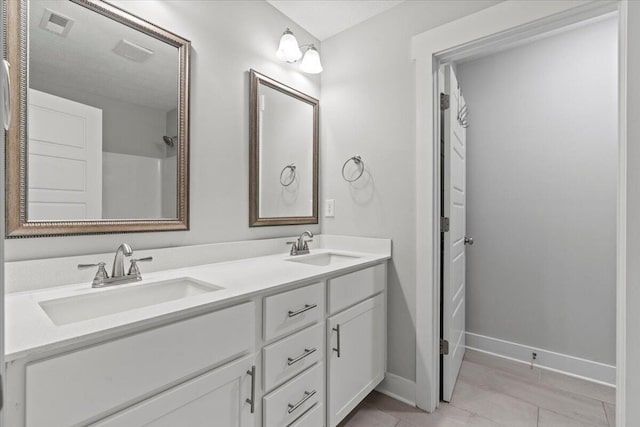 2318 Laurens St, Grovetown, GA 30813 - full bathroom with double vanity and baseboards