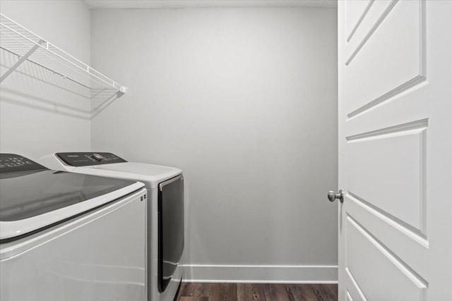 2318 Laurens St, Grovetown, GA 30813 - laundry room with washing machine and clothes dryer, dark wood-type flooring, and baseboards
