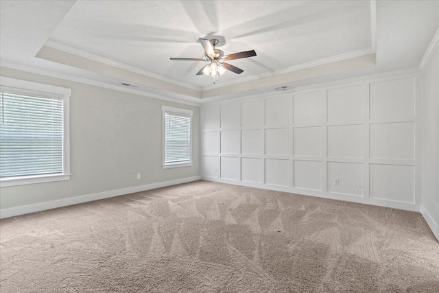 2318 Laurens St, Grovetown, GA 30813 - unfurnished room featuring ornamental molding, ceiling fan, light carpet, a tray ceiling, and baseboards