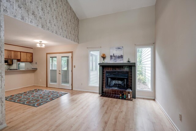 20 Teal Ct, North Augusta, SC 29841 - living room featuring baseboards, wood finished floors, and a towering ceiling