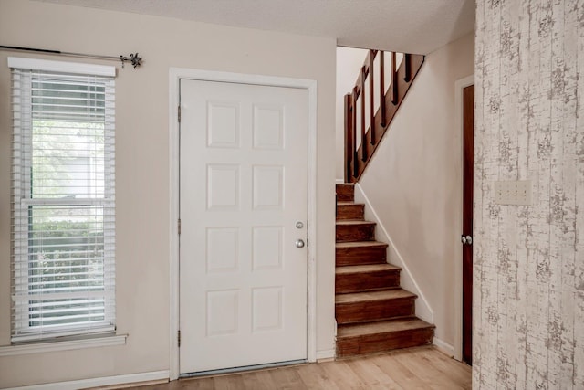 20 Teal Ct, North Augusta, SC 29841 - entrance foyer featuring stairway, light wood-style floors, and a wealth of natural light