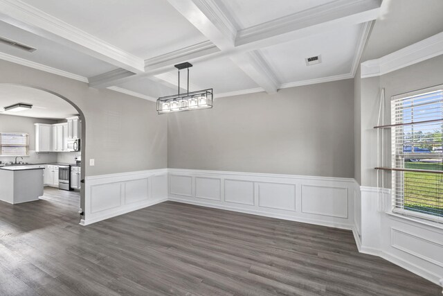 4938 Coal Creek Dr, Graniteville, SC 29829 - unfurnished dining area featuring beamed ceiling, a sink, arched walkways, dark wood-style floors, and crown molding
