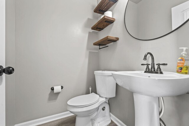 4938 Coal Creek Dr, Graniteville, SC 29829 - bathroom featuring baseboards, toilet, and wood finished floors