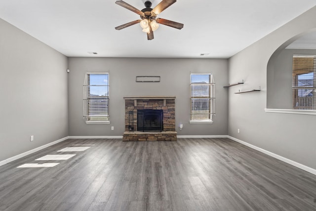4938 Coal Creek Dr, Graniteville, SC 29829 - unfurnished living room with plenty of natural light, wood finished floors, a fireplace, and baseboards