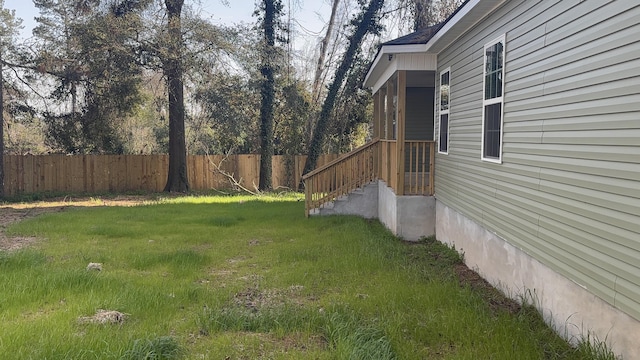 view of yard with fence