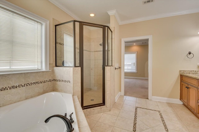 bathroom featuring tile patterned floors, vanity, separate shower and tub, and ornamental molding