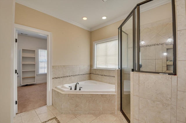 bathroom featuring tile patterned flooring, independent shower and bath, a wealth of natural light, and ornamental molding