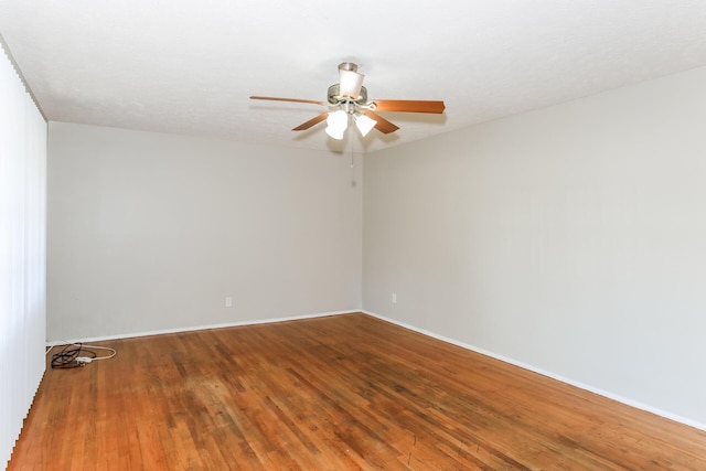 unfurnished room featuring hardwood / wood-style flooring