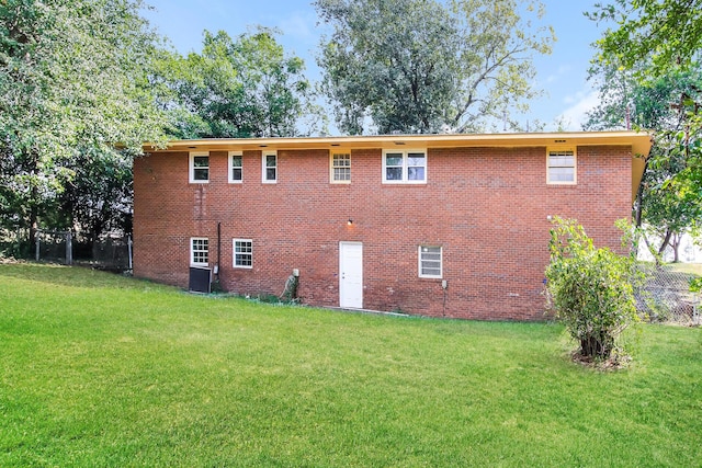 view of home's exterior featuring a lawn