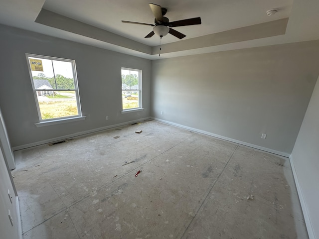 28 Coslett Dr, North Augusta, SC 29860 - empty room with a tray ceiling, a ceiling fan, and a smoke detector