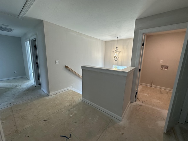 28 Coslett Dr, North Augusta, SC 29860 - hall with an upstairs landing and a chandelier