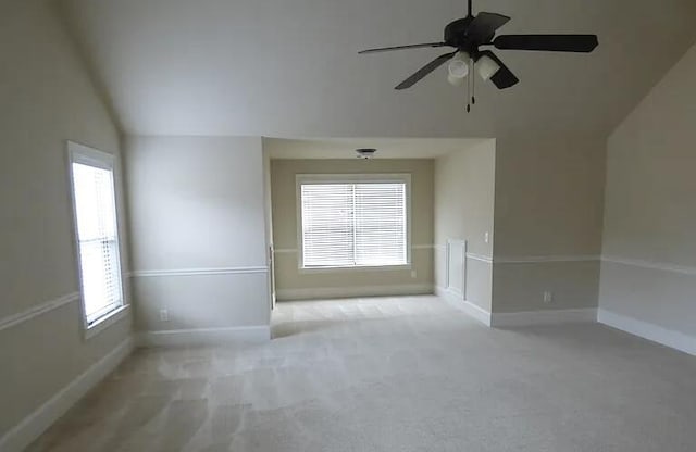 1139 Prides Xing, Aiken, SC 29801 - unfurnished room featuring vaulted ceiling, plenty of natural light, carpet flooring, and a ceiling fan