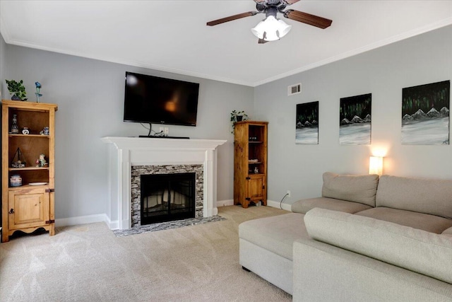 945 Watermark Dr, Evans, GA 30809 - carpeted living area featuring ceiling fan, a fireplace, crown molding, and baseboards