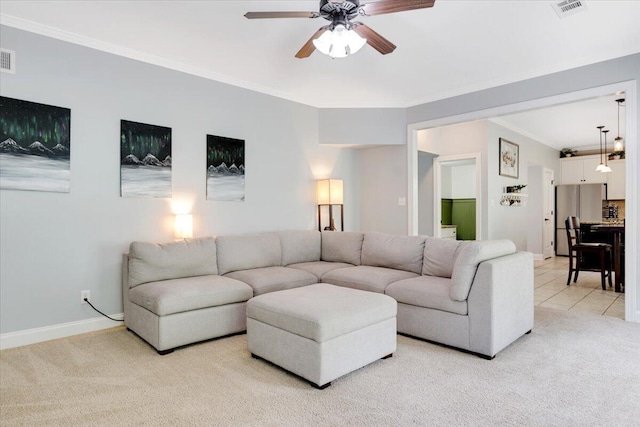 945 Watermark Dr, Evans, GA 30809 - living room with light carpet, ornamental molding, ceiling fan, and baseboards