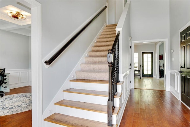 945 Watermark Dr, Evans, GA 30809 - stairs with hardwood / wood-style floors, a decorative wall, and a wainscoted wall