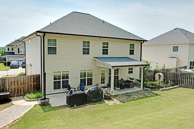 945 Watermark Dr, Evans, GA 30809 - rear view of property with a patio, roof with shingles, and a garden