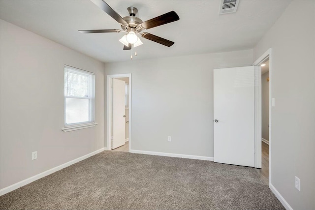 unfurnished bedroom with light carpet and ceiling fan