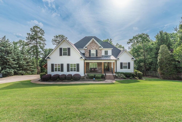 295 River Wind Dr, North Augusta, SC 29841 - view of front of home featuring a porch, a standing seam roof, and a metal roof