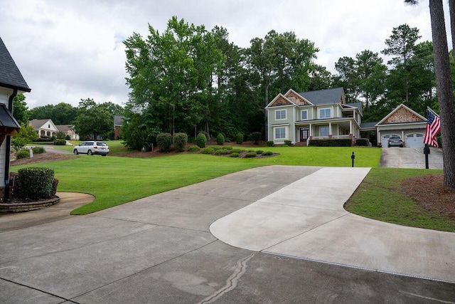 295 River Wind Dr, North Augusta, SC 29841 - view of grassy yard with driveway and an outdoor structure