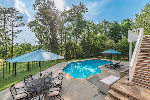 295 River Wind Dr, North Augusta, SC 29841 - view of pool with stairway, a patio area, a fenced backyard, and outdoor dining area