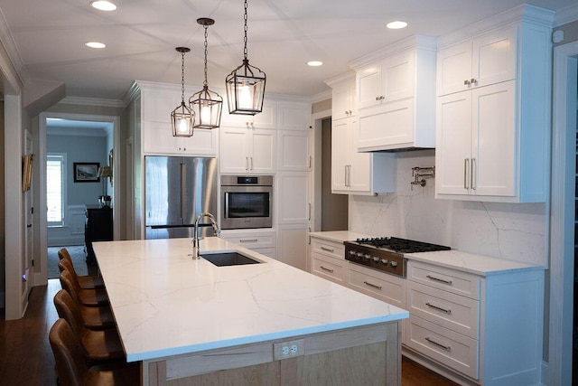 295 River Wind Dr, North Augusta, SC 29841 - kitchen with appliances with stainless steel finishes, white cabinetry, tasteful backsplash, light stone counters, and recessed lighting