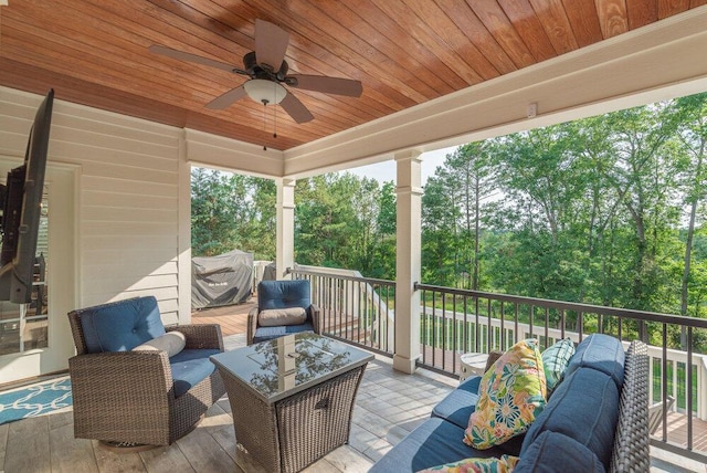 295 River Wind Dr, North Augusta, SC 29841 - wooden deck with an outdoor living space, a ceiling fan, and view of wooded area
