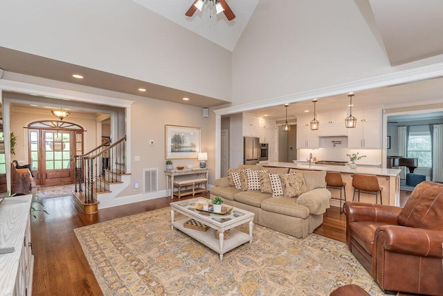 295 River Wind Dr, North Augusta, SC 29841 - living room with stairs, wood finished floors, a ceiling fan, recessed lighting, and high vaulted ceiling