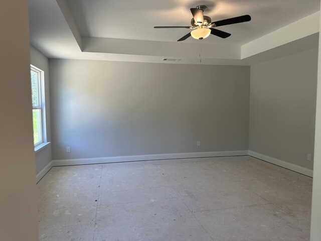 1457 Elias Sta, Thomson, GA 30824 - unfurnished room with ceiling fan and a tray ceiling