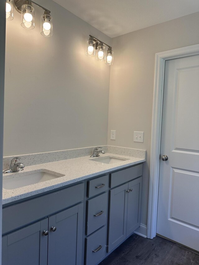 1457 Elias Sta, Thomson, GA 30824 - bathroom featuring hardwood / wood-style floors and vanity