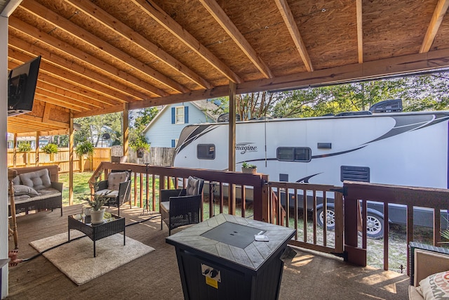 wooden deck featuring an outdoor hangout area