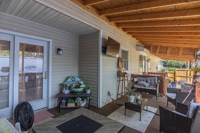 view of patio / terrace with an outdoor living space and covered porch