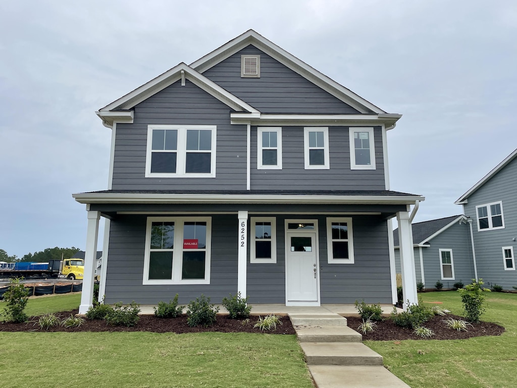 view of front facade with a front yard