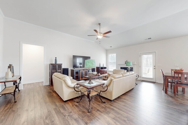 living room featuring hardwood / wood-style flooring, ceiling fan, and lofted ceiling