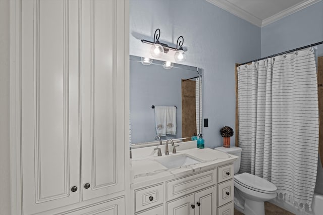 full bathroom featuring toilet, vanity, ornamental molding, and shower / tub combo