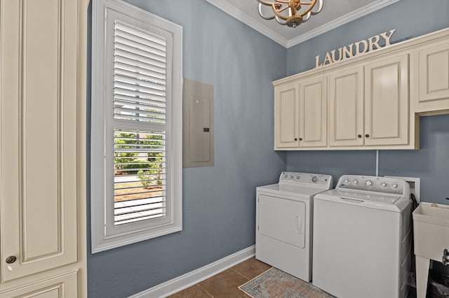 laundry area with cabinet space, washer and clothes dryer, electric panel, baseboards, and a chandelier