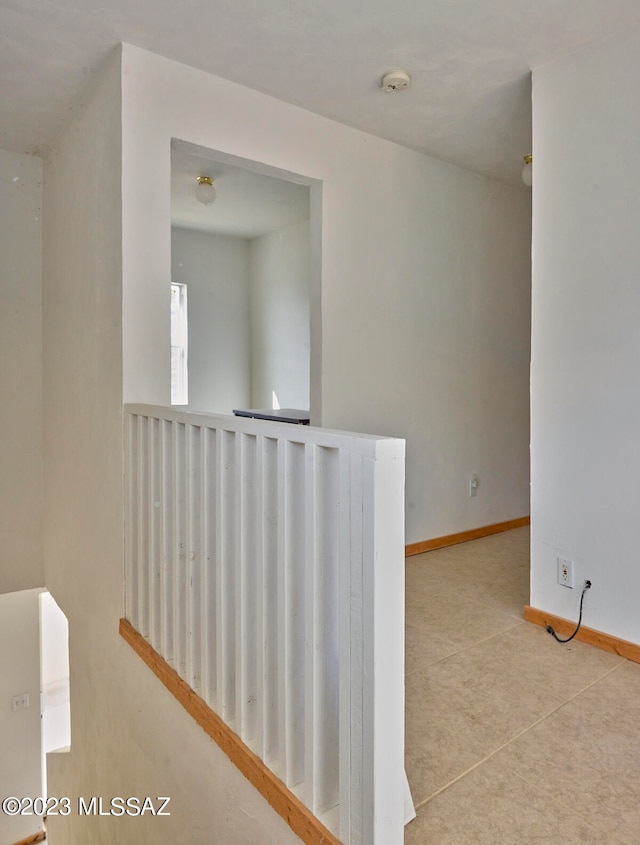 empty room featuring light tile flooring