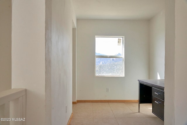 interior space with light tile floors