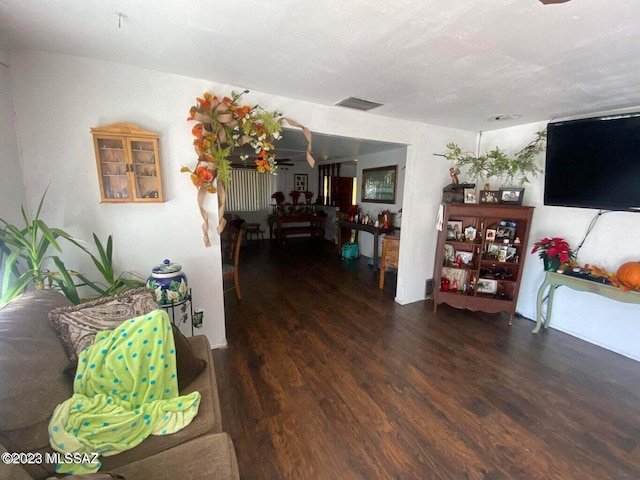 living room with dark hardwood / wood-style floors