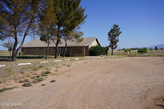 ranch-style house with a mountain view