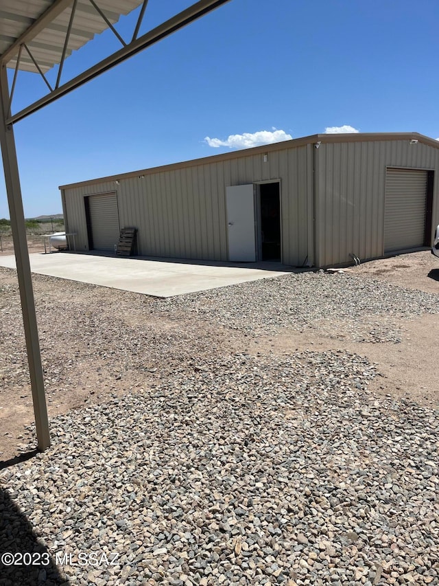 view of outdoor structure featuring a garage