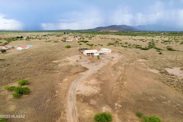 drone / aerial view with a rural view and a mountain view