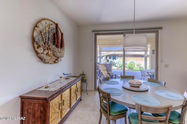 dining area with light tile floors