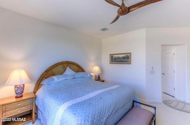 bedroom with ceiling fan and light colored carpet