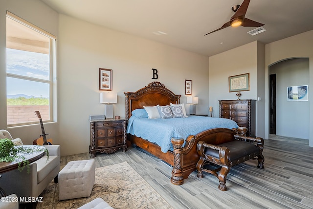 bedroom featuring ceiling fan and light wood-type flooring