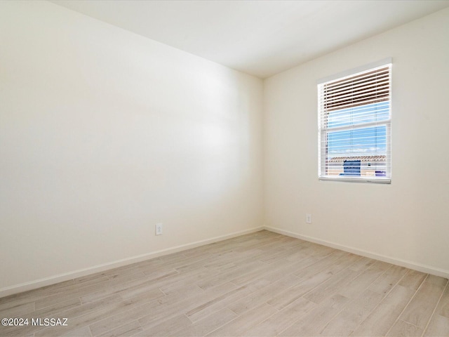 empty room with light wood-type flooring