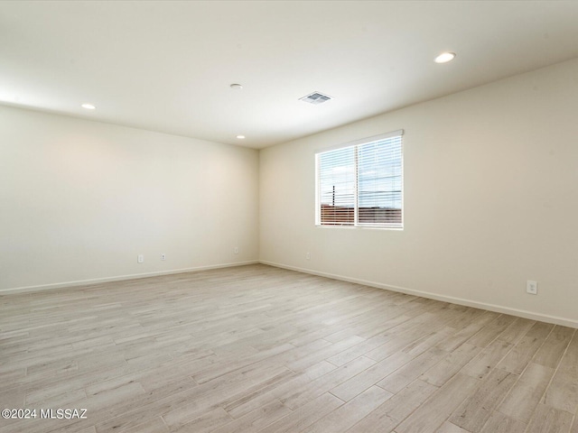 empty room featuring light hardwood / wood-style floors