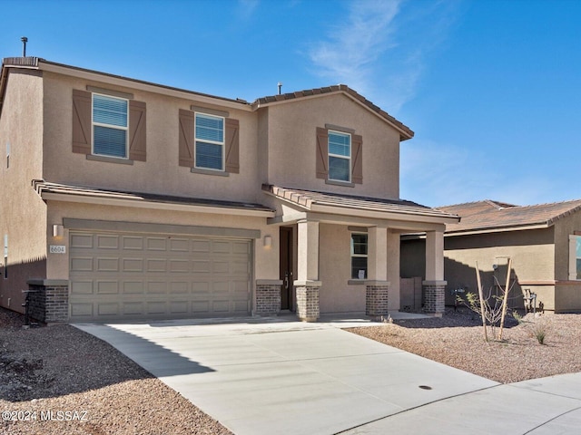 view of front of house with a garage