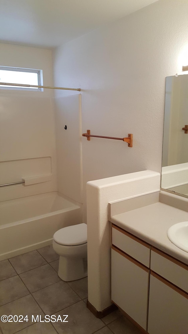 full bathroom featuring shower / bathtub combination, tile flooring, toilet, and vanity